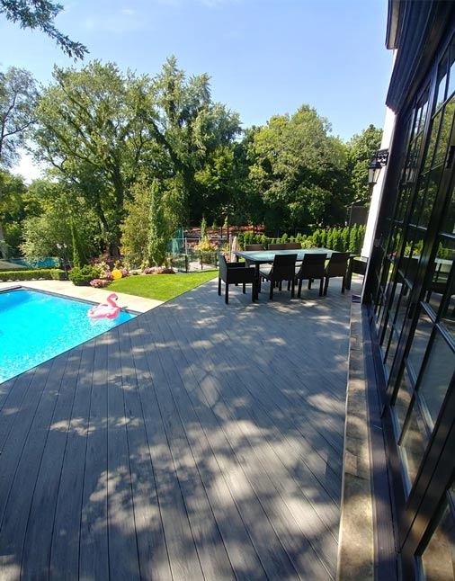 stone-deck-pool-grey-colour-inspiration-ideas-terrace-pool-summer-moisture-resistant-composite-boards-wood-planks-ontario-canada-mississauga-toronto-etobicoke